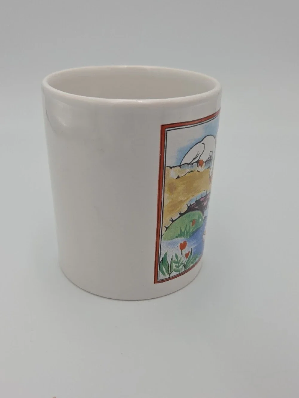 White Ceramic Goose Handle Mug with Colorful Farm Scene